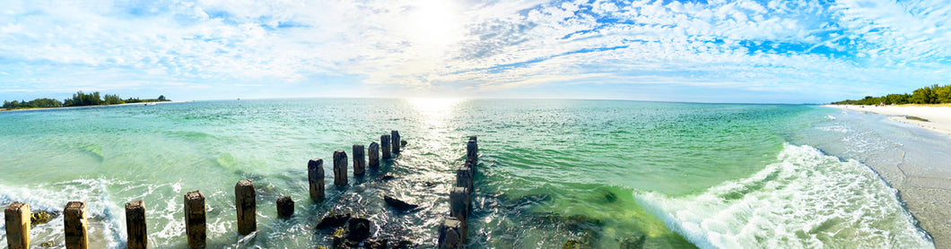 Coquina Beach Sunset Florida printed on natural pine wood.